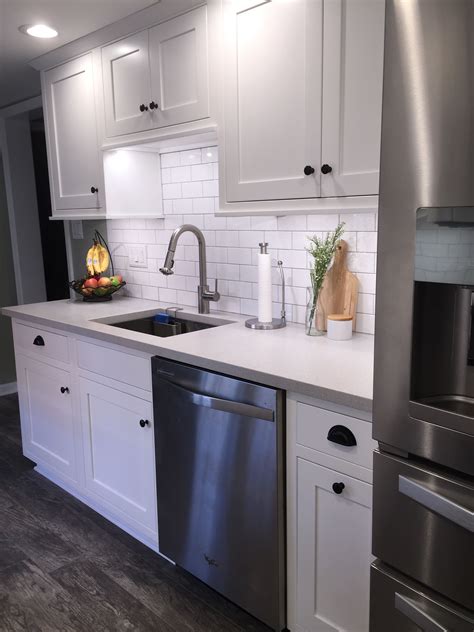 galley white cabinets stainless steel appliances|white galley kitchen designs.